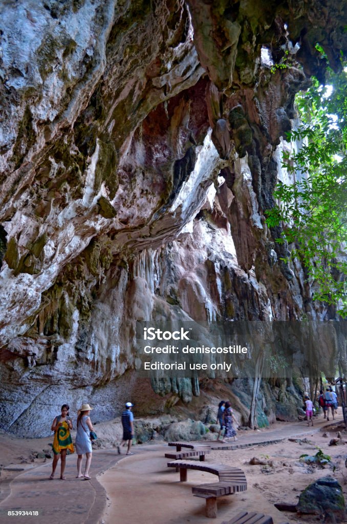 Along the footpath between East Railay beach and Phra Nang beach Limestone cliff with stalactites along the footpath between East Railay beach and Phra Nang beach, Thailand - October 24th, 2014 Ao Nang Stock Photo