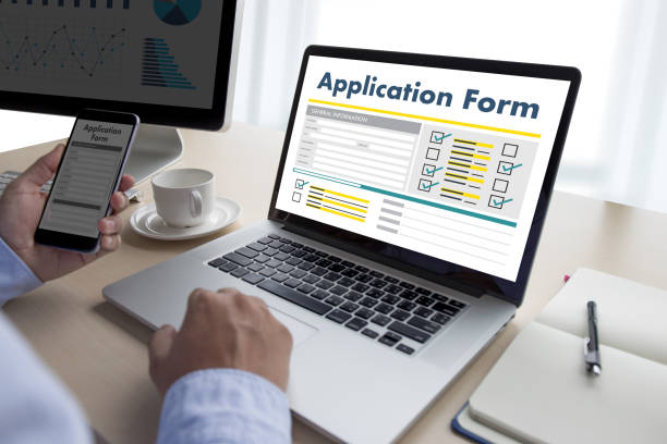 istock business man working on laptop computer use Online Web Job Application Form moniter 853934974