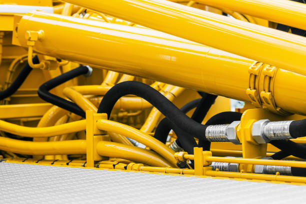 istock pipes and the hydraulic system of the tractor 853935440