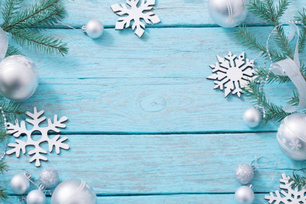 istock Christmas decoration on blue wooden background 853938752