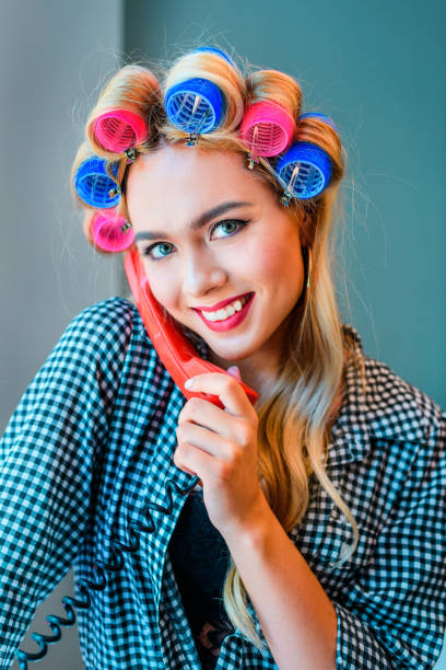 istock woman talking on telephone 853939192