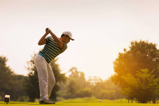 istock Golfers are going to hit a golf ball. On the golf course during the summer 853943140