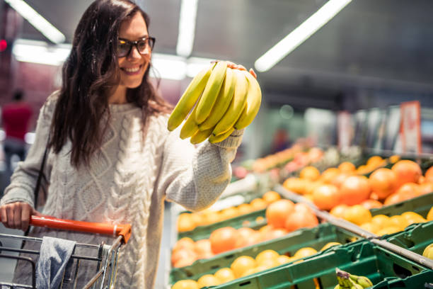 Woman shopping in the supermarket for some groceries