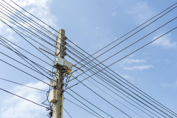 istock pattern cable line of electricity post in blue sky and cloud 853948888