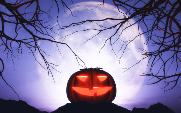 istock 3D Halloween pumpkin in moonlit landscape 853955194