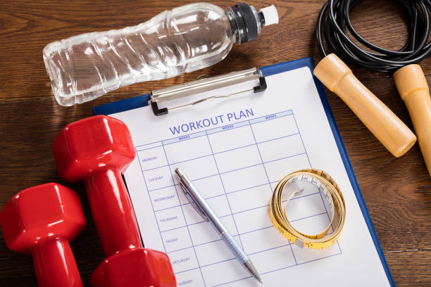 istock Workout Plan Form With Fitness Equipments 853955846