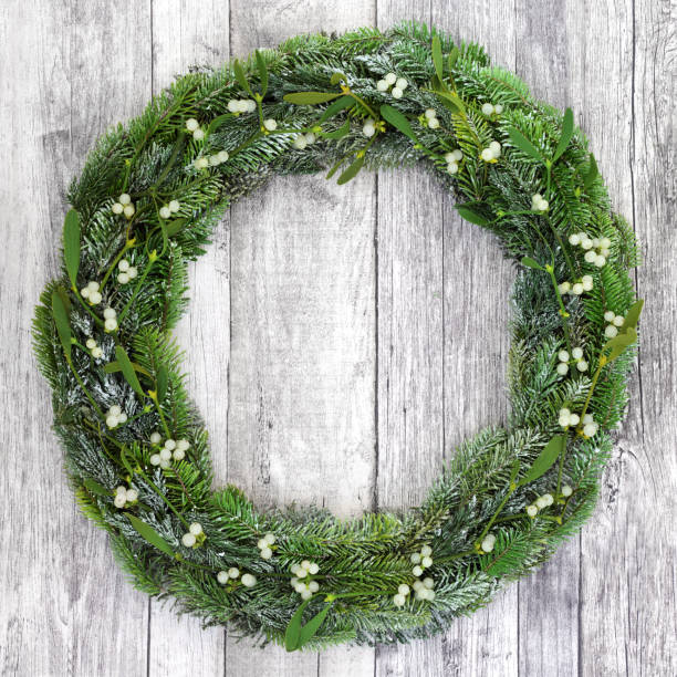 istock Winter Mistletoe and Fir Wreath 853959378