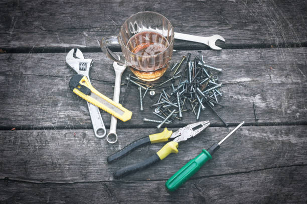 Set of hand tools on a wooden background. Vintage style. Men's work.