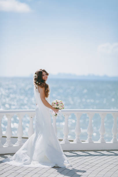 istock Portrait of a beautiful bride on wedding day 853963608