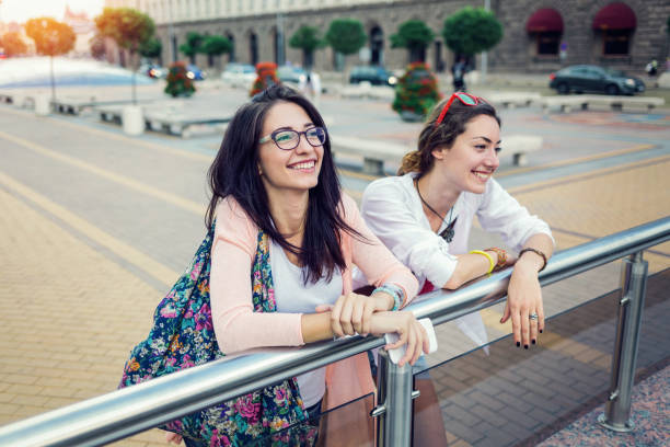 istock Young happy friends having fun and laughing 853963996