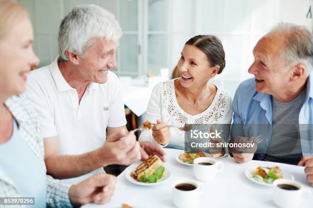 Conversation By Dessert Stock Photo - Download Image Now - Senior Adult, Dining, Eating