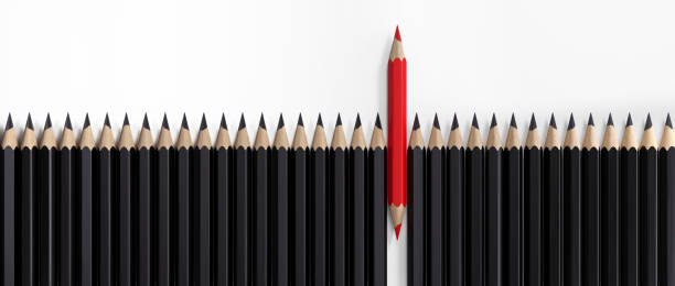 istock Red Colored Pencil Standing Out From The Crowd 853973118