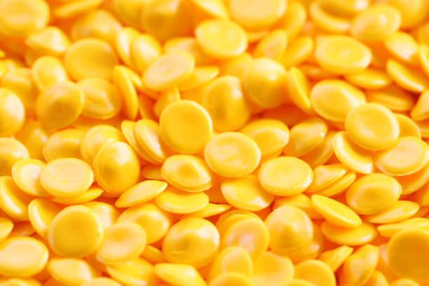 istock close up of industrial plastic pellets as background. 853973252