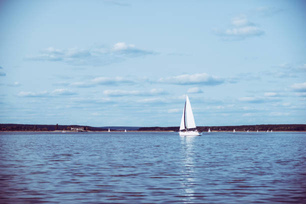 holiday on a yacht sailing on a lake at a weekend or vacation