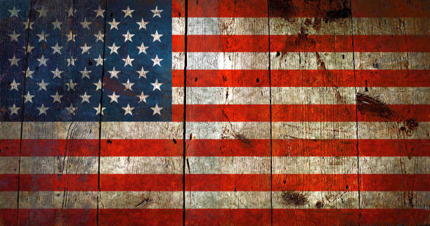 istock Flag of USA, painted on a grunge plank 853990616