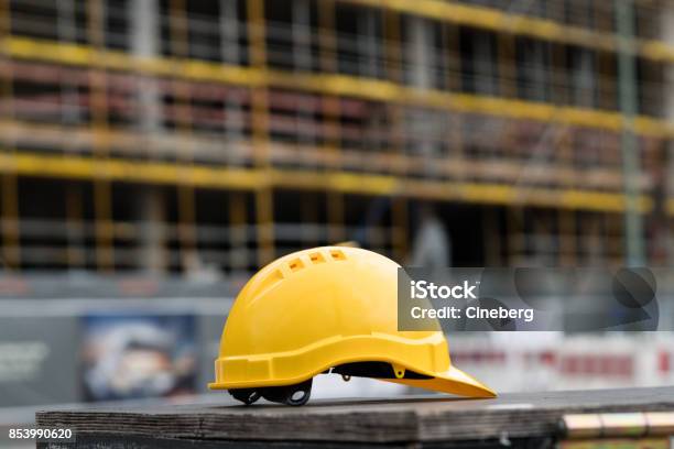 Yellow Safety Hardhat Side View Stock Photo - Download Image Now - Construction Site, Construction Industry, Hardhat