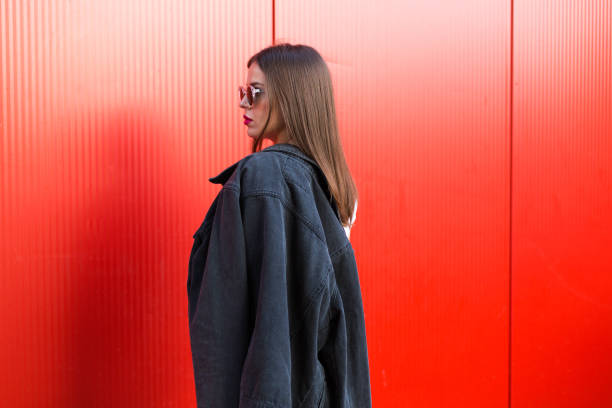 istock Woman with black denim jacket 853990844