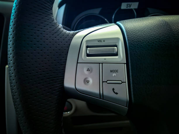 istock Car audio control buttons on the steering wheel 853993348