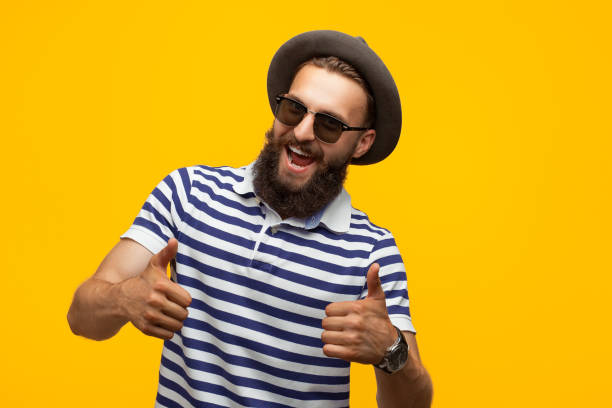 istock Cheerful hipster gesturing thumbs up 853993446