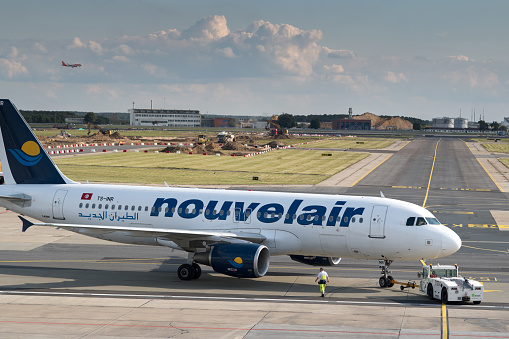 Berlin, Germany - September 22, 2017: Nouvelair airplane. Nouvelair Limited Company is a Tunisian airline operating tourist charters from European cities to Tunisian holiday resorts