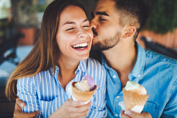 istock Happy couple having date and eating ice cream 854000854