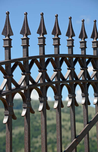 istock Black ornamental iron fence 854002168