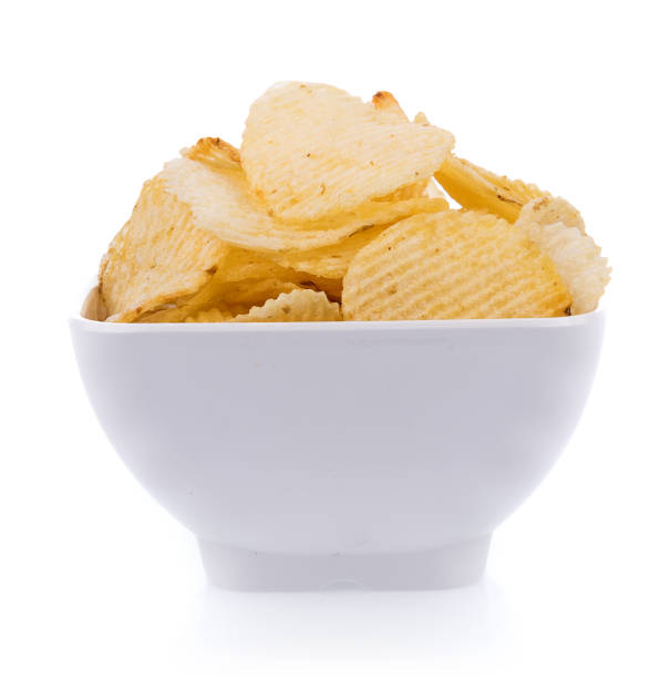 istock potato chips in bowl  isolated on white background 854006726