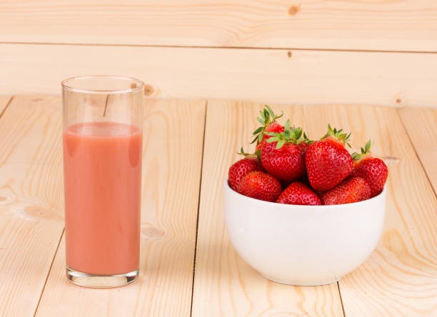 istock Glass of strawberry smoothie. 854010136