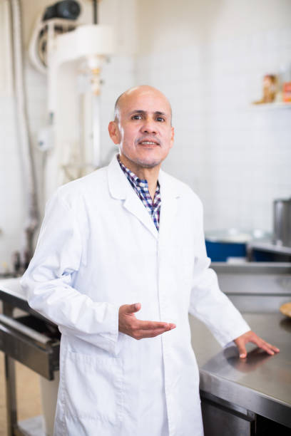 istock Man working in modern food factory 854010204