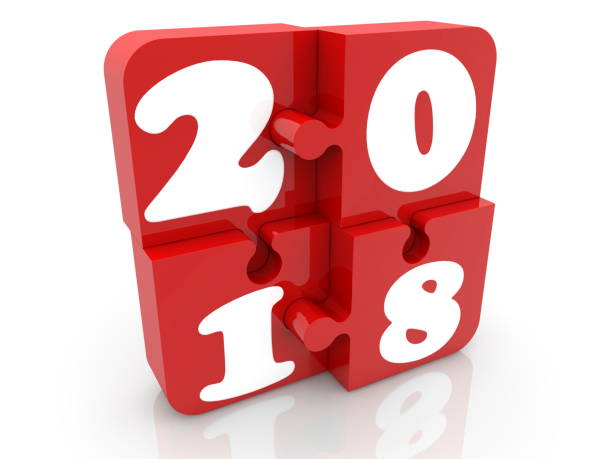 istock Puzzle pieces in red with inscription 2018 854010766