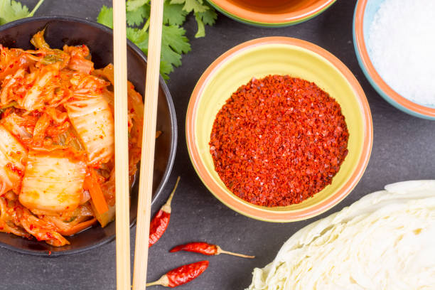 istock Top view of Kimchi or kimchee on black plate 854011802