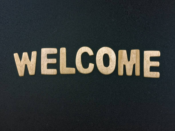 istock Welcome word wooden letters 854019350