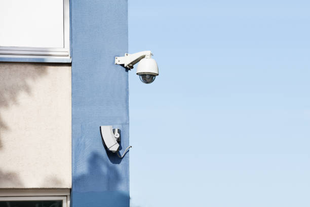 istock Security Camera On The Wall Of Building 854025042