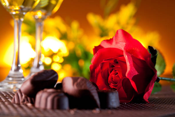 Red roses and chocolate stock photo