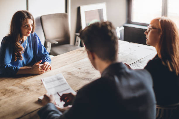 Nervous on job interview Woman on job interview in modern office good cv stock pictures, royalty-free photos & images