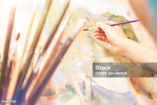 Close Up Of Hand With Brush Working On Abstract Picture Stock Photo - Download Image Now