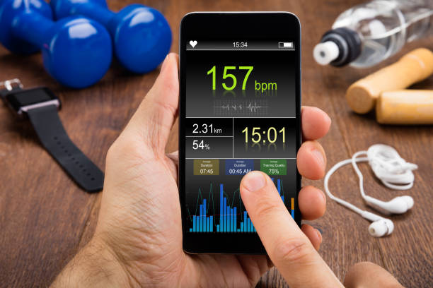 istock Person Checking Heart Rate On Mobilephone 854032566
