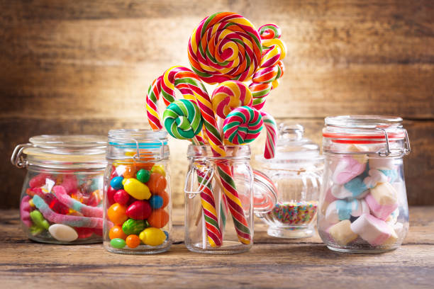 https://media.istockphoto.com/id/854034102/photo/colorful-candies-jellies-lollipops-marshmallows-and-marmalade-in-a-glass-jars.jpg?s=612x612&w=0&k=20&c=gP8WN4F3uqIFFlqK2ap-t3Xudljm3j48wjt3lwTgJw4=