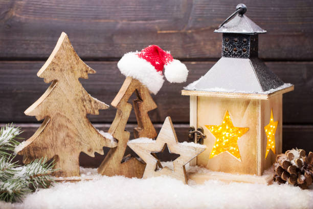 istock Burning lantern and christmas decoration in the evening. 854037168