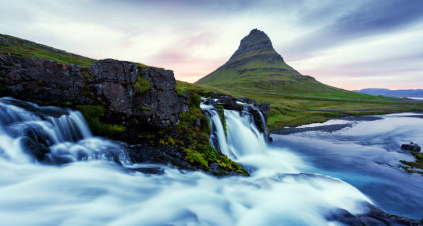 istock Colorful sunrise on Kirkjufellsfoss waterfall 854038832