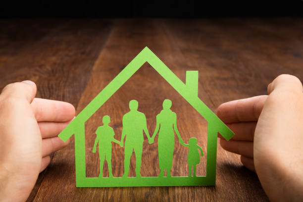 istock Person Hand Protecting Family Home 854044628