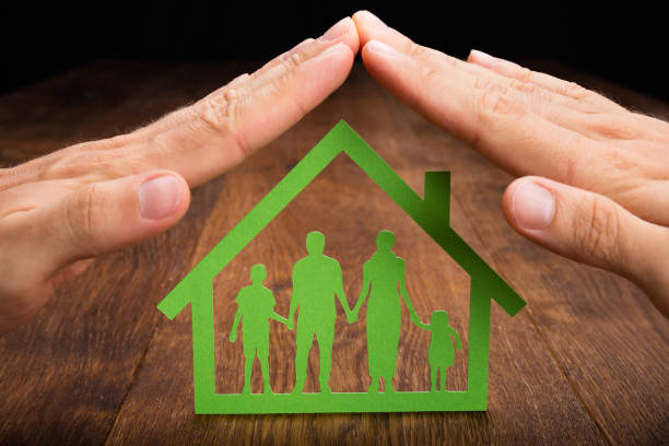 istock Person Hand Protecting Family Home 854044630