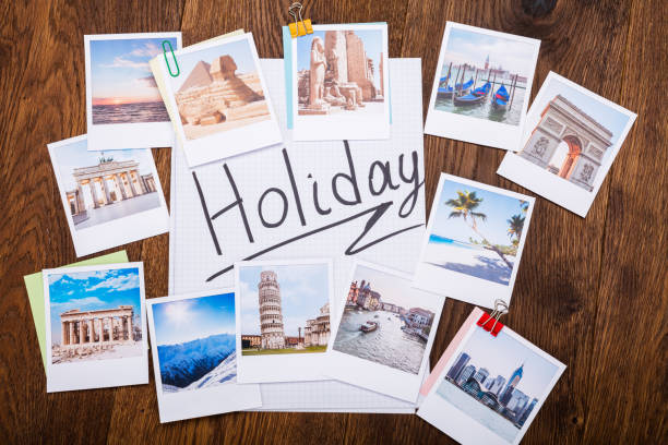 istock Holiday Photos On Wooden Desk 854061920