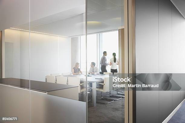 Businesspeople Having Meeting In Conference Room Stock Photo - Download Image Now - Office, Glass - Material, Modern