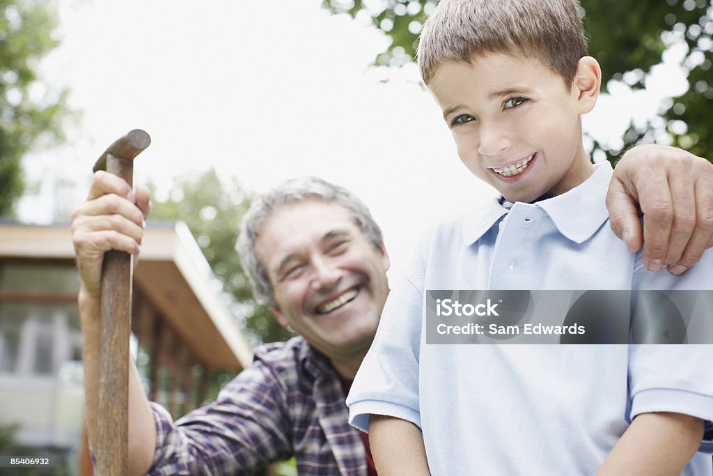 Grandfather and grandson gardening  55-59 Years Stock Photo