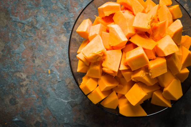Pumpkin pieces in a glass plate free space
