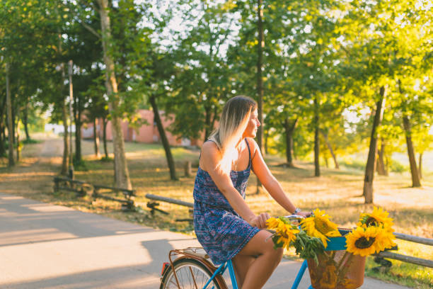 istock Woman riding bicycle 854078118