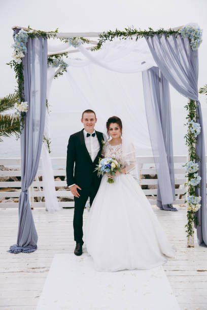 istock Beautiful wedding couple at a wedding ceremony 854084788