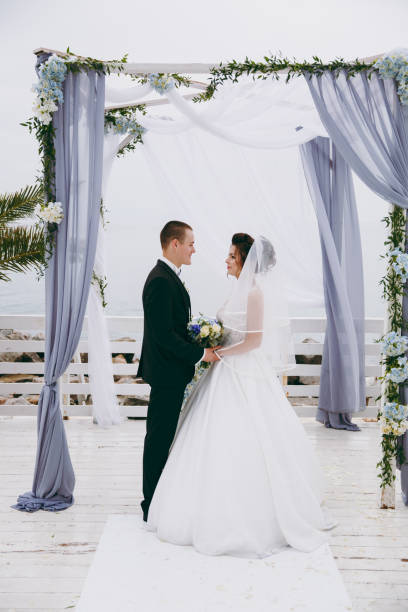 istock Beautiful wedding couple at a wedding ceremony 854084916