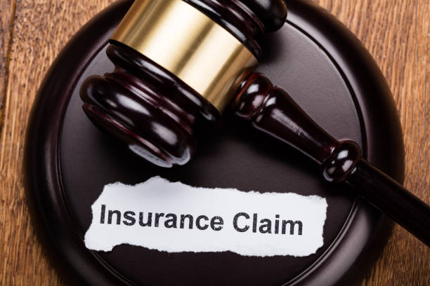 istock Insurance Claim Concept On Wooden Gavel 854090360